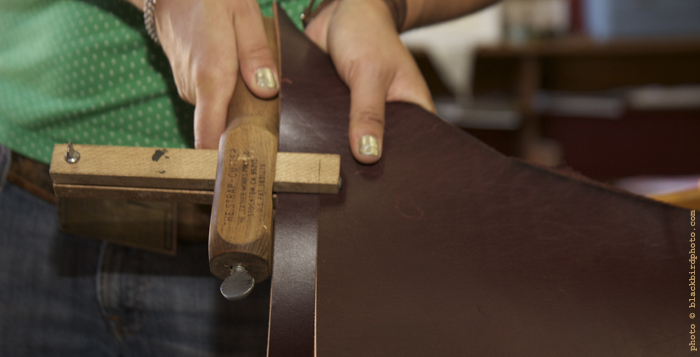 strap cutting a leash from the hide